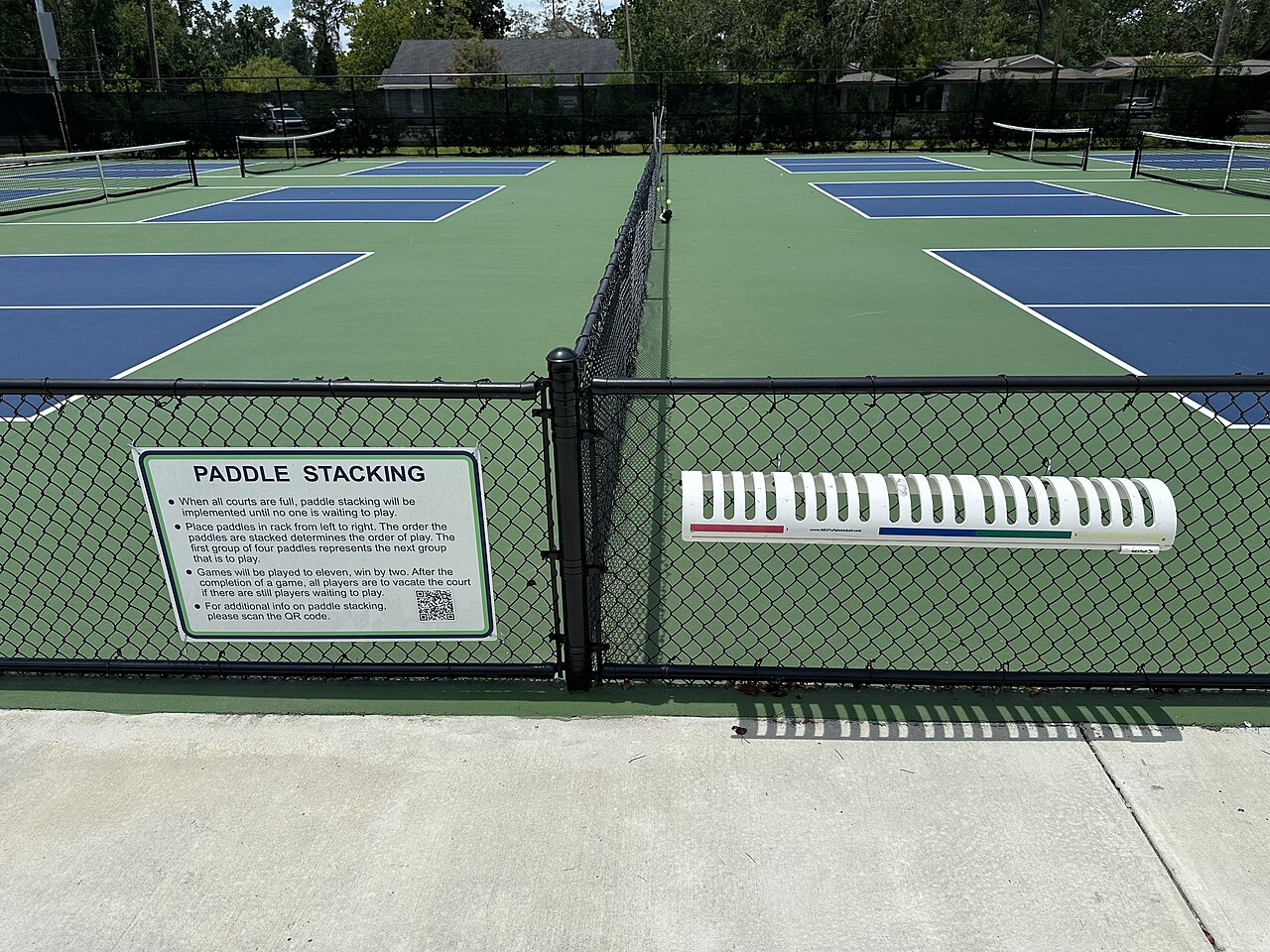 Located in the center of the pickleball courts at the Harry B. Anderson Tennis Center in Valdosta, Georgia, United States, adjacent to pickleball cour