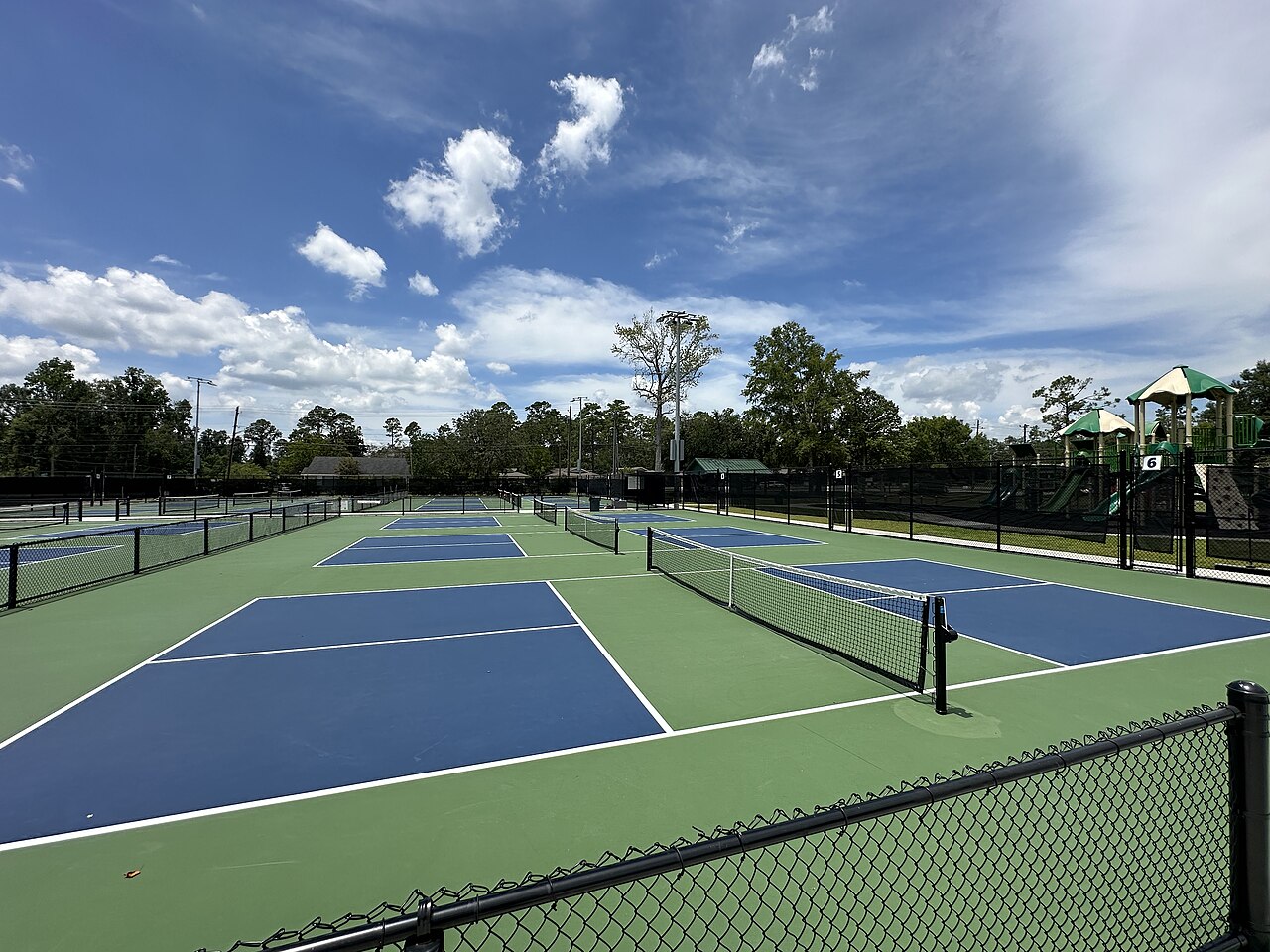 Photo taken from the east side of the courts facing west, this image is of pickleball courts 4, 5, and 6 at the Harry B. Anderson Tennis Center in Val