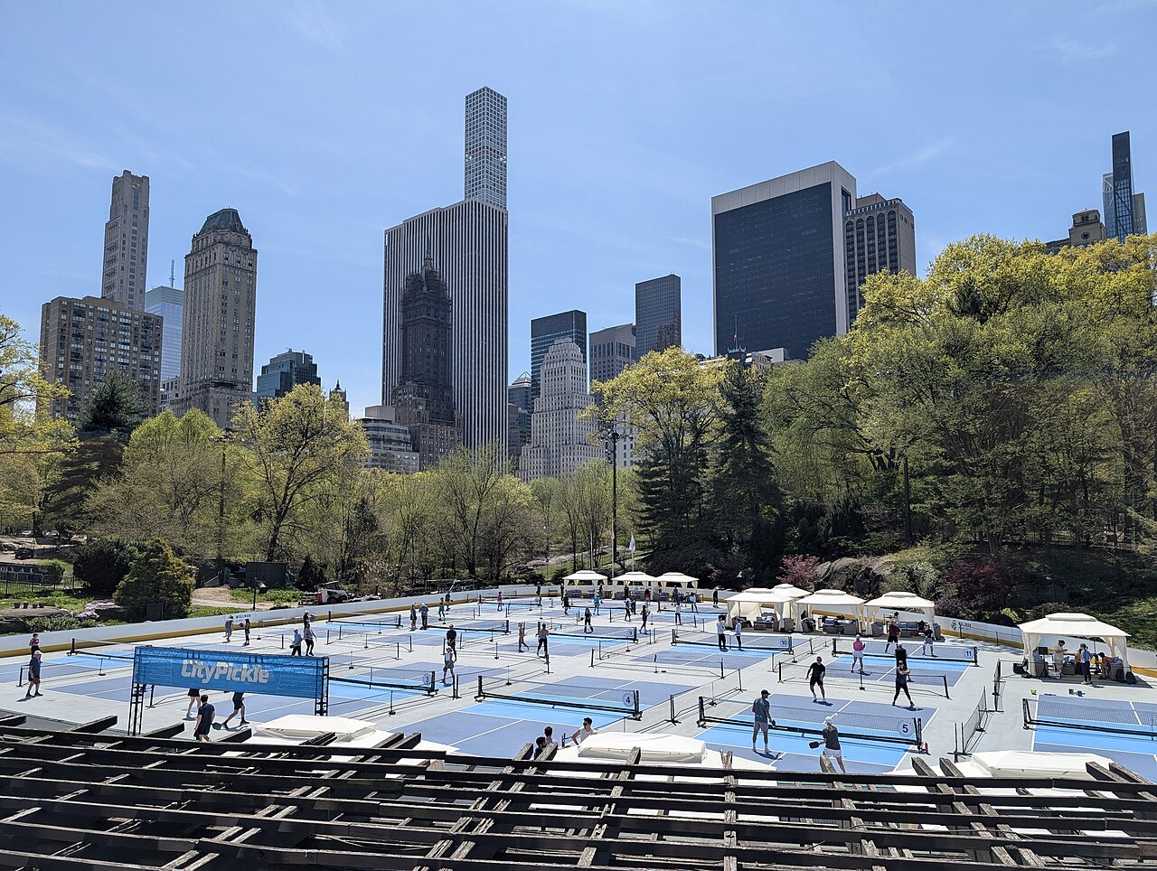 Pickleball courts inhabiting the space during the spring where the Wollman Ice Rink usually is