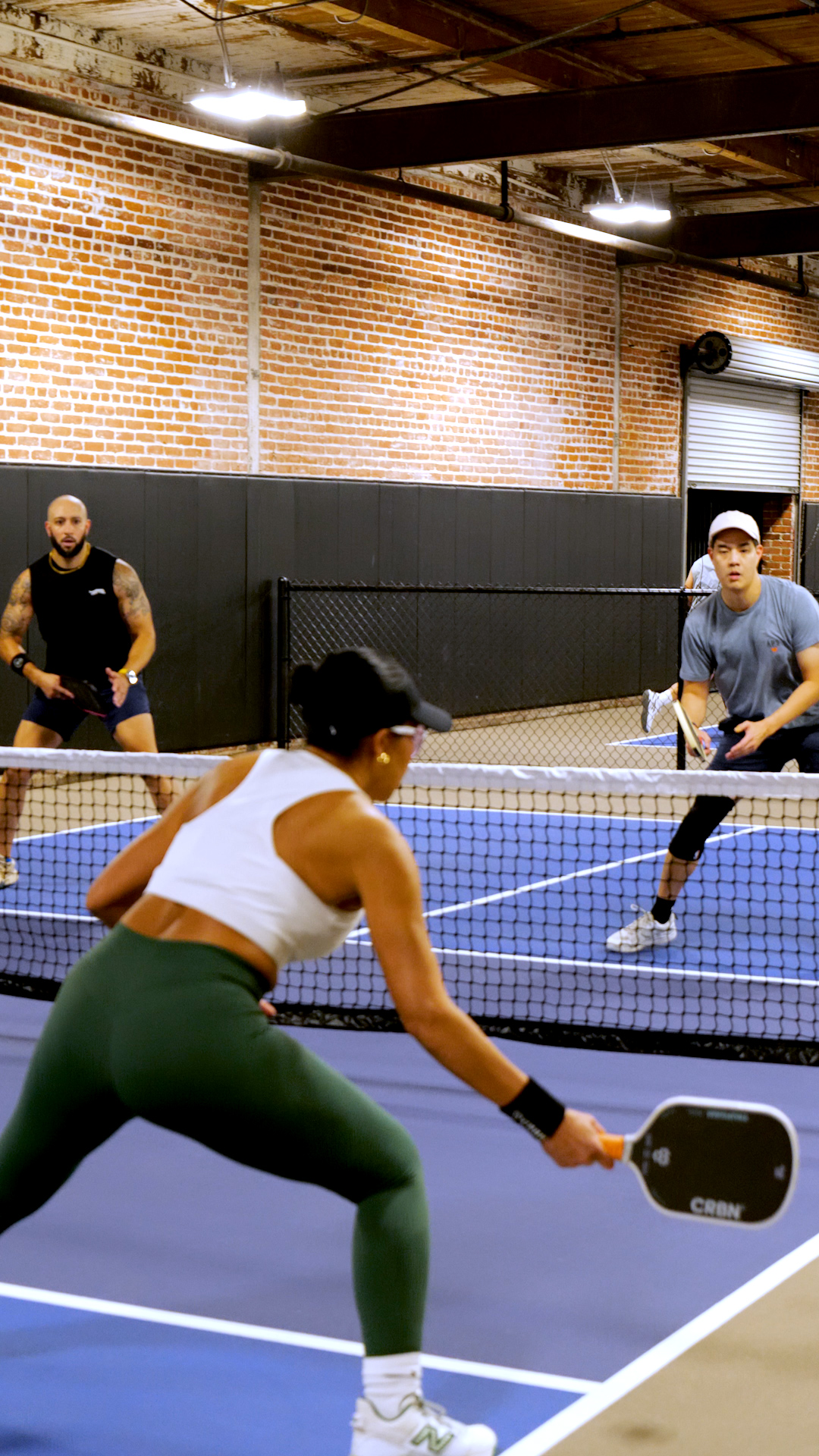 Pickle Alley members playing pickleball during Open Play